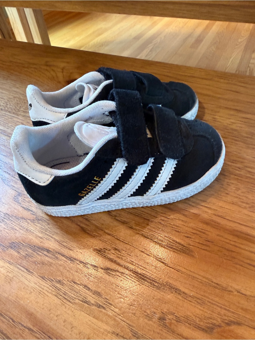 Adidas Gazelle black sneakers with white stripes